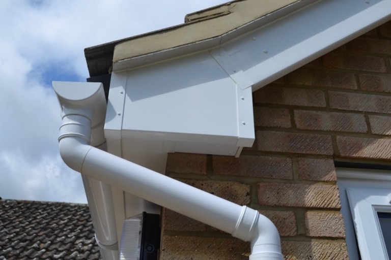 New gutter and downpipe installation Roofing Wimbledon